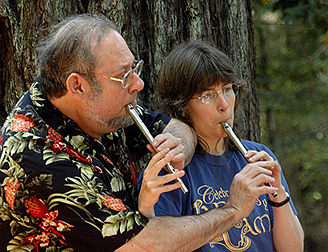 Beth & Mickie Zekley playing crosshanded whistle duet