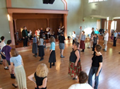 Dancers lined up in Bishop's Ranch pavilion